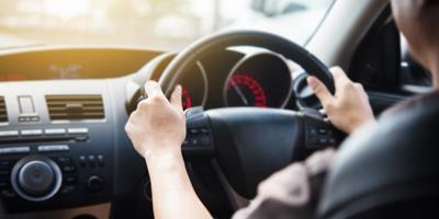 close up of driving in car